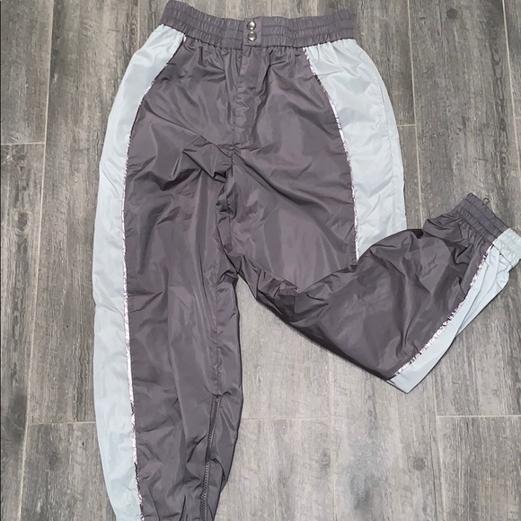 Gray windbreaker/reflective pants. - Picture 1 of 1